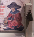 Egy leprás középkori ábrázolása, kezében a csengettyűvel