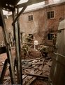 Brit katonák romokat takarítanak el egy támadás helyszínén